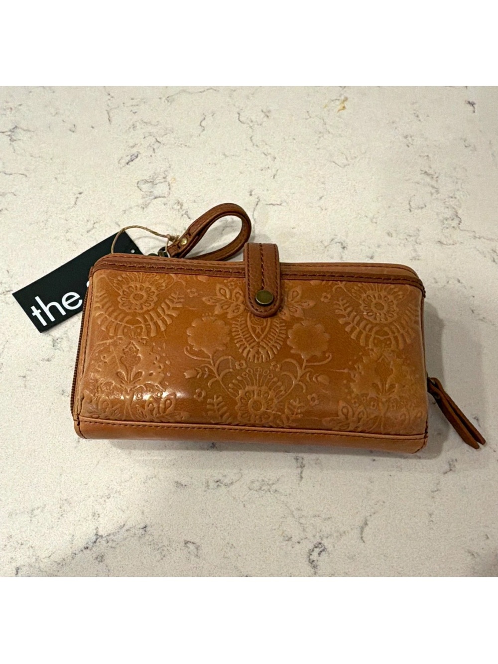 The Sak Iris Brown Floral Embossed Wristlet Zip Wallet Organizer Credit Card
